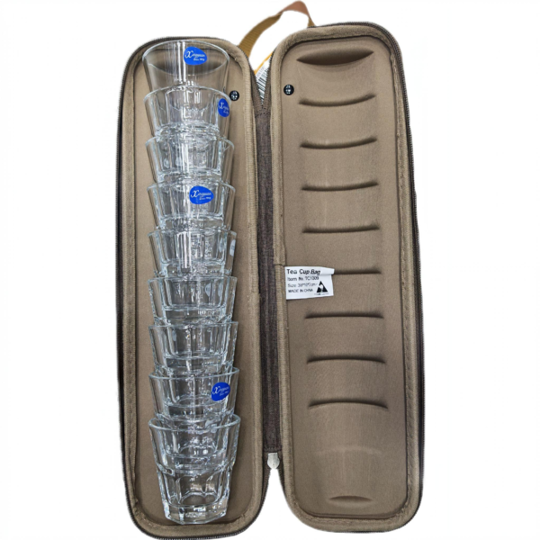 Stack of clear glass tumblers stacked in a brown padded travel case with a zip closure.