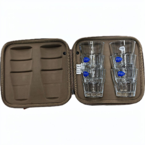 Open brown travel case containing two stacks of clear glass tumblers with blue brand stickers on each glass, organized in right side.